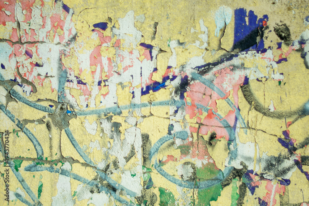 Naklejka premium A colorful abstract background. Old, cracked, peeling paint serves as the backdrop.