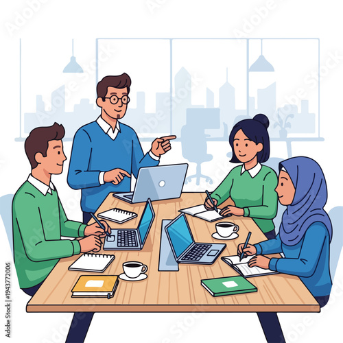 A team of four individuals working on a project in an office