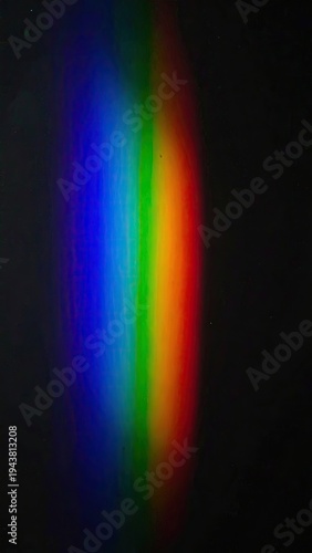 Vertical spectrum of light against a dark background