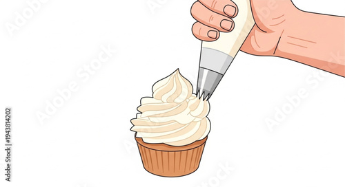 Hand icing a cupcake sweet.