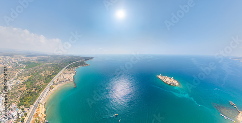 Wallpaper Mural Kizkalesi, Mersin, Turkey. Expansive aerial panorama of legendary Maiden Castle island, surrounded by deep blue Mediterranean Sea, sandy shores and modern resort. Aerial view Torontodigital.ca