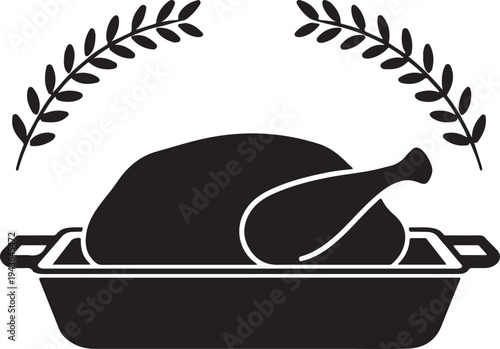 A beautifully roasted turkey resting in a dish surrounded by elegant leaves