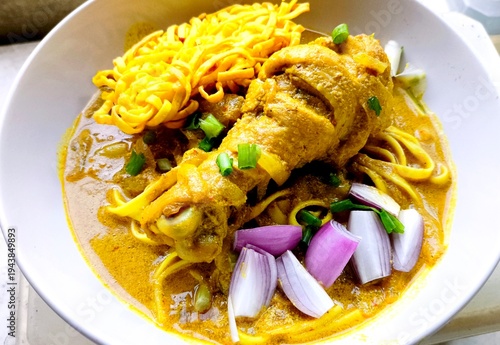 Steaming hot khao soi northern thai noodle curry soup