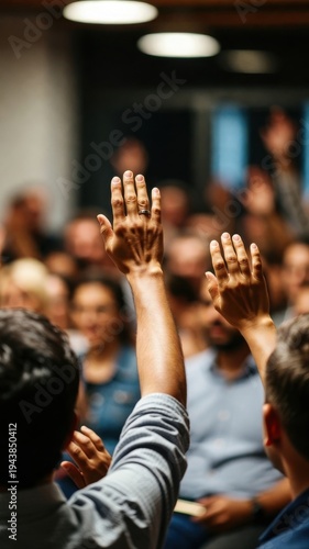 Raised hands during community meeting discussion