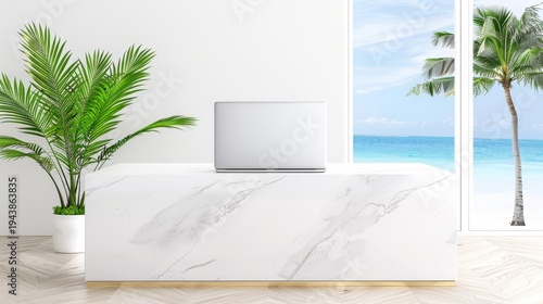 Laptop placed on marble counter with ocean view interior