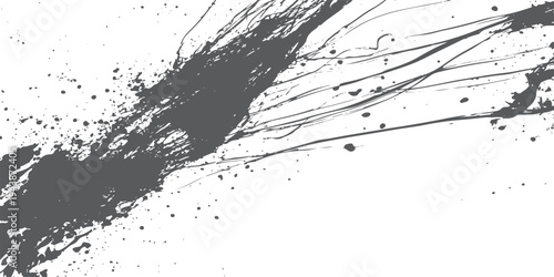 Dark grey paint splatters and drips on white background