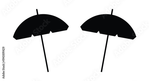Two black silhouettes of beach umbrellas against a white background