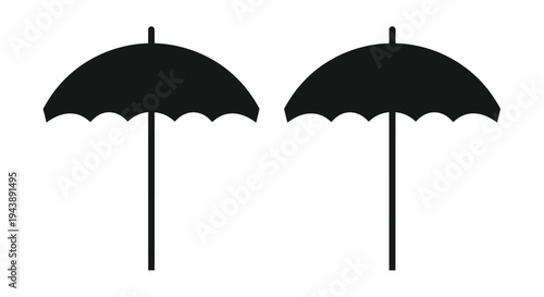 Two black silhouettes of open beach umbrellas against a white background