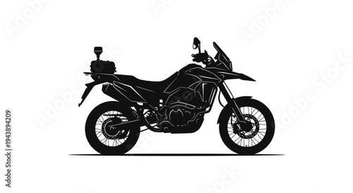 Silhouette of a dual-sport motorcycle with luggage rack and antenna, isolated on white