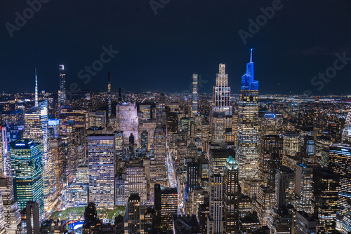 Tableau sur toile Night aerial view of Midtown Manhattan skyline with illuminated skyscrapers and