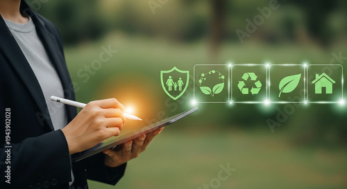 A person interacts with a tablet displaying environmental protection icons in a verdant outdoor setting. Embracing eco-friendly practices with the help of technology and nature.