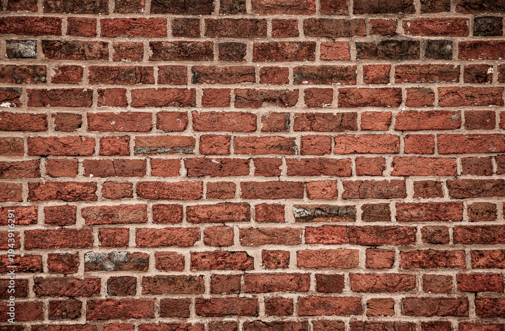 Obraz premium Red bricks masonry wall texture. Vintage bricks brick wall background pattern. Rustic bricks wall surface structure. Classic bricks mortar wall.
