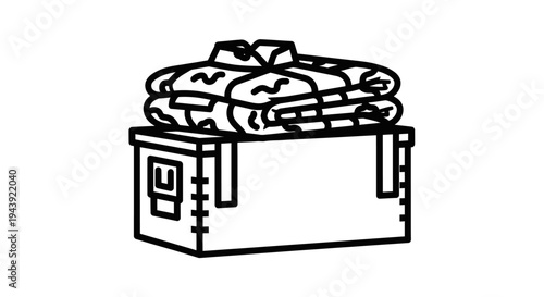 Folded Clothes Stacked on Cardboard Box, Moving or Storage Concept