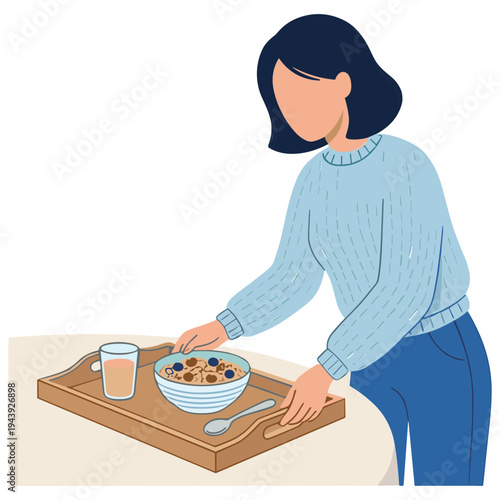 Woman serves breakfast with cereal bowl and juice on a wooden tray indoors