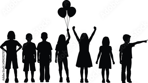 Silhouette of a happy family with two children jumping and celebrating together with their pet dog in the great outdoors.