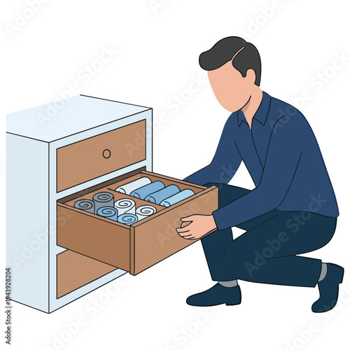 Man kneels beside an open drawer filled with office supplies