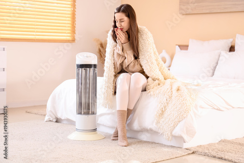 Frozen young woman with pla...