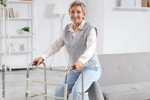 Mature woman with walker si...