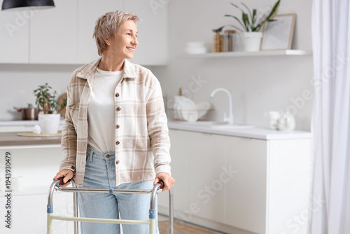 Mature woman with walker in...