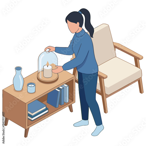 Woman placing glass dome over lit candle on wooden coffee table next to chair