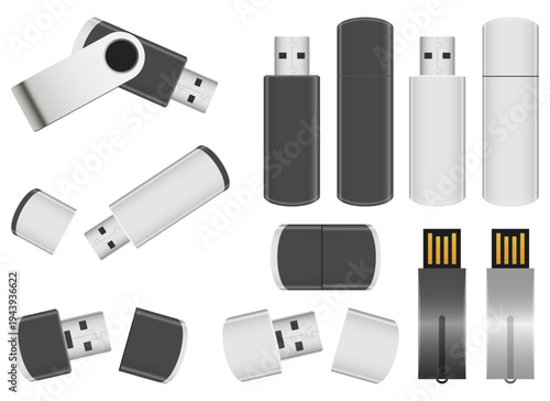 Selection of black and white USB flash drives in various positions.