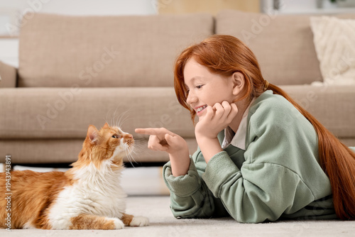 Redhead teenage girl with c...