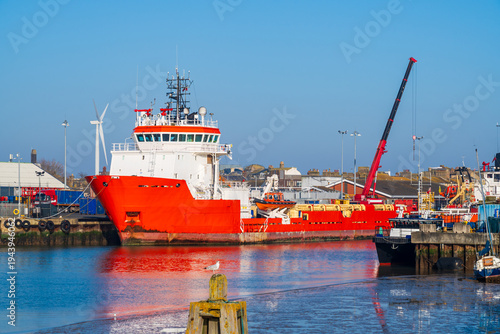 Foto Emergency response ship moored in a port