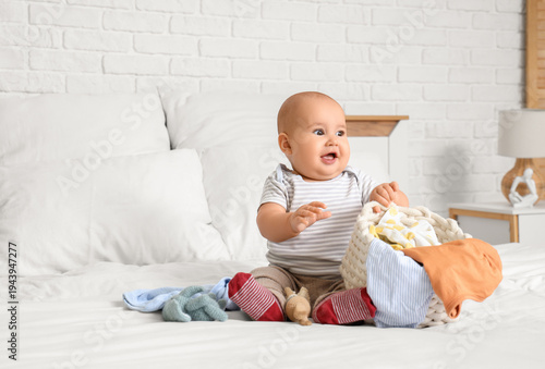 Cute little baby with baske...