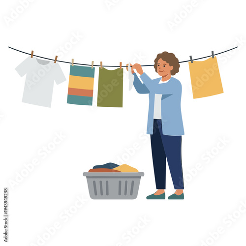 Woman hanging colorful laundry on clothesline with basket nearby outside