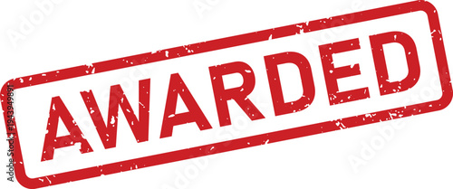 A distressed red rubber stamp displaying the word AWARDED within a rectangular border on a clean white surface