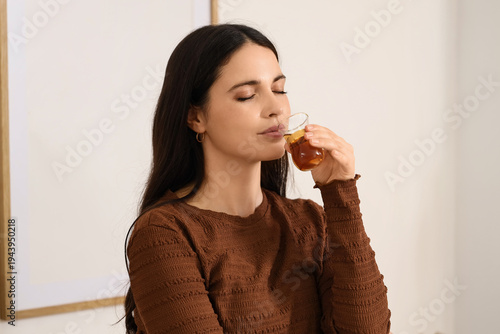 Young woman drinking Turkis...