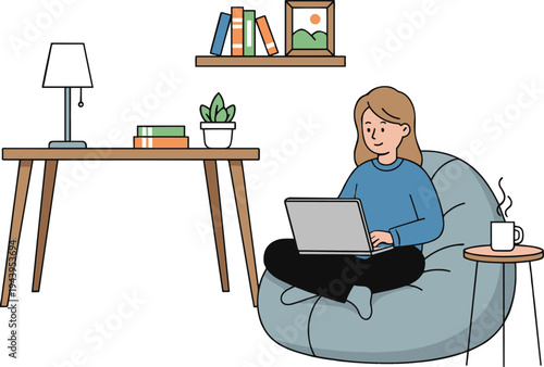 A woman sits in a bean bag chair with a laptop