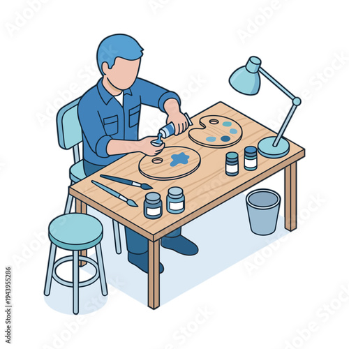 A man in a workshop assembles electronic components on a wooden table with tools.