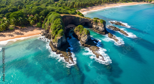 A stunning high-angle drone shot of a rocky coastline with a natural stone arch and clear blue sea water