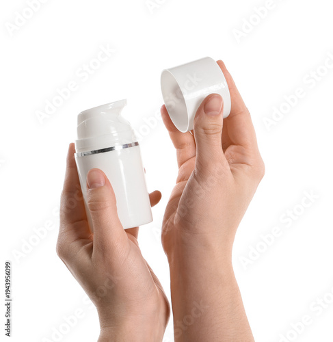 Female hands with bottle of...
