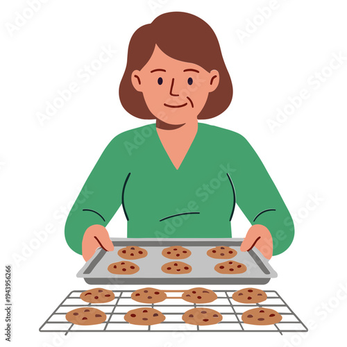 Woman baking cookies on a cooling rack in her kitchen at home