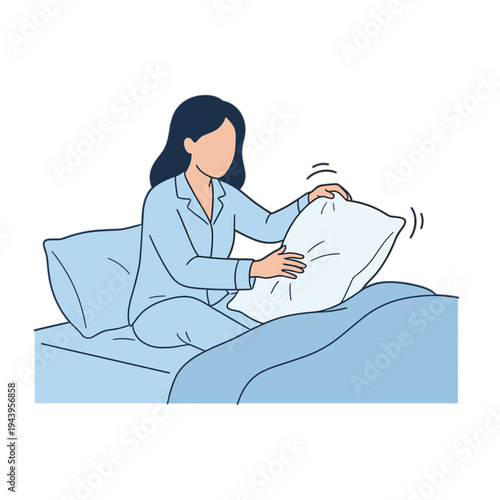 Woman fluffing pillow on bed in morning light sleepwear