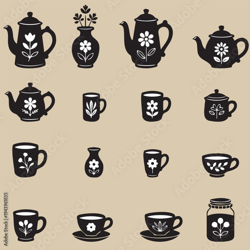 Black and white dishware set with flowers, teapot, cup