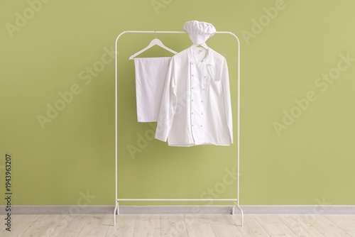 Rack with chef's uniform ne...