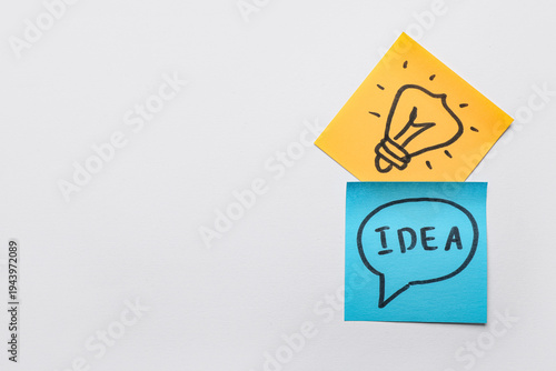 Sticky notes with drawn lig...