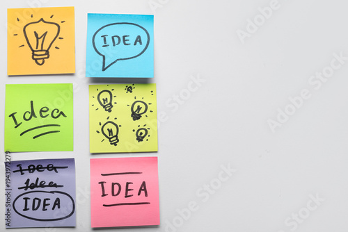 Sticky notes with drawn lig...