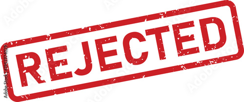 A vivid red rectangular stamp with a clear grunge appearance features the bold uppercase word REJECTED