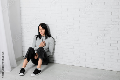 Young woman having panic at...