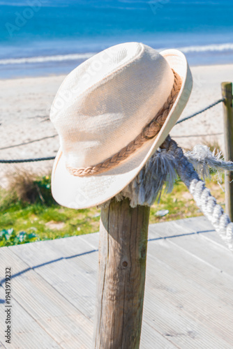 hat on the beach. vacation concep