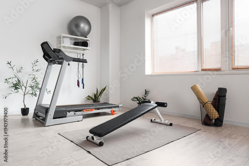 Interior of modern gym with...