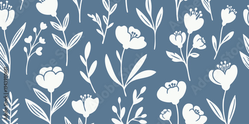 A beautiful floral pattern of white flowers and leaves on a blue background