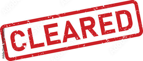 Red grunge rubber stamp mark with the word CLEARED on a white document surface
