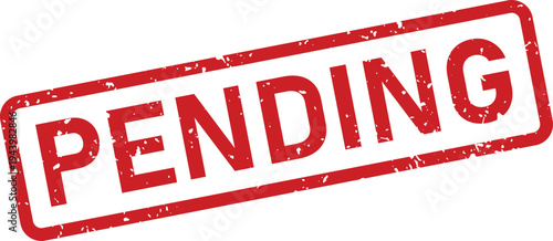 Red rectangular rubber stamp with a distressed texture showing the word PENDING against a white surface