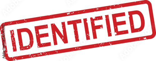A bold red rectangular grunge rubber stamp with the word IDENTIFIED clearly marked on a white backdrop