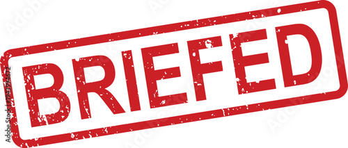 A bold red rubber stamp with an aged texture shows the word BRIEFED against a clean white surface